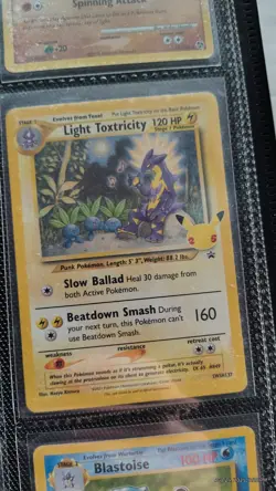 Pokemon TCG Light Toxtricity SWSH137 Holo Card English Celebrations Rare - Image 1