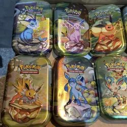 Pokemon TCG Set of 8 Empty Mini Tins Prismatic Evolutions (Tin, Coin, Art Card) - Image 2