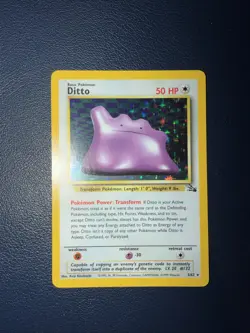1999 Pokemon TCG Ditto Fossil 3/62 Holo Rare Card - Image 1