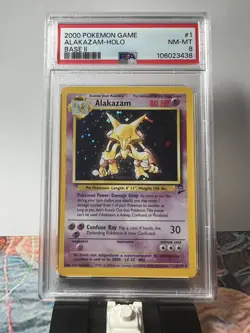 Pokemon TCG 2000 Base 2 Set Alakazam 1/130 Holo Rare PSA 8 NM-MT - Image 1