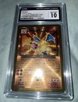 CGC 10 - Charizard 4/102 Celebrations UPC Gold Metal Pokemon Promo Card - Image 1