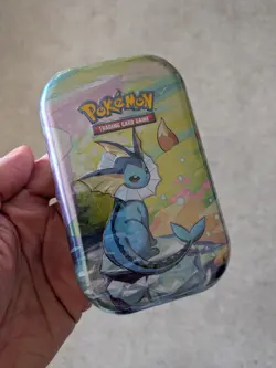 Pokemon TCG Prismatic Evolutions Vaporeon Mini Tin - Brand New & Sealed - Image 1