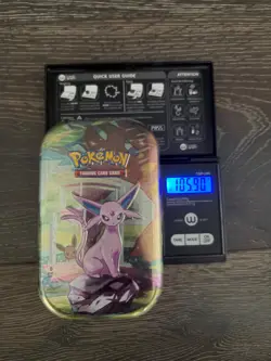 105.90 EXTRA HEAVY! Pokemon Prismatic Evolutions Mini Tin - Possible GOD PACKU - Image 1