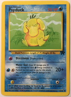 POKEMON PSYDUCK 65/82 TEAM ROCKET COMMON NEAR MINT - Image 1