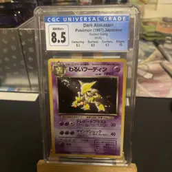 1997 POKEMON ROCKET GANG HOLO JPN #065 DARK ALAKAZAM CGC 8.5 WITH SWIRL - Image 1