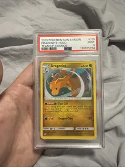 2019 POKEMON SUN & MOON TEAM UP COSMOS #119 DRAGONITE-HOLO PSA 9 - Image 1