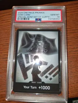 2025 ONE PIECE PROMOS SPECIAL DON!! SET VOL.1 -LUFFY- DON!! CARD PSA 10 - Image 1
