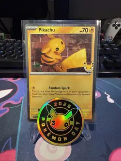 Pikachu 051/162 | STAMPED Pokemon Day 2026 | Cosmos Holo Promo (With Coin) - Image 1
