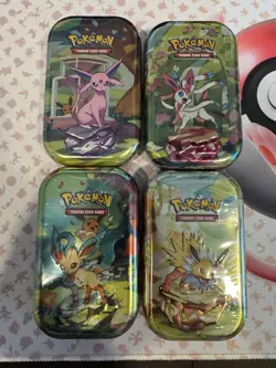 Lot of 4 | Sealed Prismatic Evolutions Mini Tins | Pokemon TCG - Image 1
