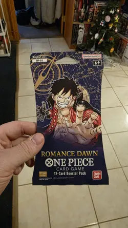 Bandai One Piece Card Game Romance Dawn 12-Card Booster Pack English - Image 1
