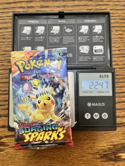 22.47g Pokemon TCG Surging Sparks booster pack Sealed - Image 1