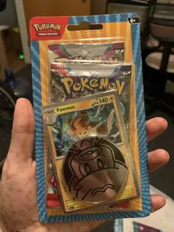 Pokemon TCG Blister 2 Booster Packs with Pawmot Metallic Coin (2024) - Image 1