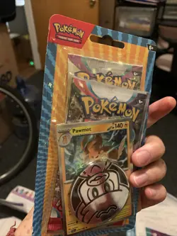 Pokemon TCG Blister 2 Booster Packs with Pawmot Metallic Coin (2024) - Image 5
