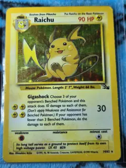 Pokemon Raichu Fossil 14/62 Holo Rare 1999 Wizards Base Set Copyright - Image 1