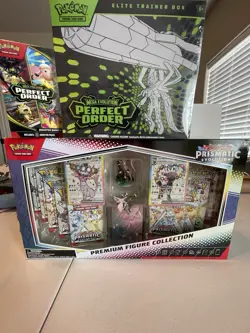 Pokemon Sealed Lot Prismatic Evolutions Figure + PO ETB + PO Booster Bundle - Image 1