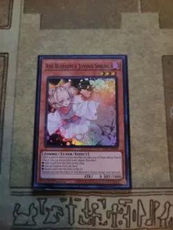 YUGIOH ASH BLOSSOM JOYOUS SPRING RA01-EN008 SUPER 1ST ED NM - Image 1