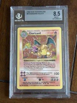 1999 Pokemon Game Charizard Base Set Shadowless Holo #4 BGS 8.5 - Image 1