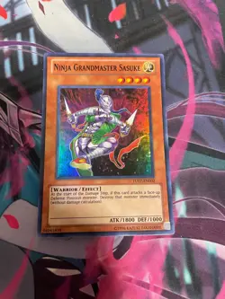 YUGIOH - NINJA GRANDMASTER SASUKE - SUPER RARE - TU07 - NM - Image 1