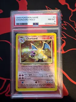 1999 Base Set Unlimited Charizard Holo Pokemon TCG 4/102, PSA 8 NM/Mint - Image 1