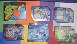 Pokemon TCG Sealed Lot Tin, Elite Trainer Box and Battle Deck Bundle - Image 1