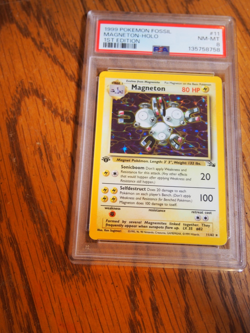 Pokemon 1999 1st Edition Fossil Magneton rare holo card, PSA 8 - Image 1