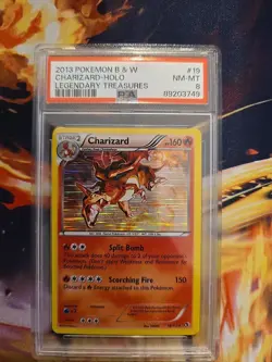 2013 Pokemon B&W Charizard Holo Legendary Treasure PSA 8 - Image 1