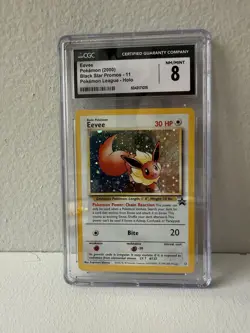 CGC 8 Eevee 2000 Black Star Promos 11 Pokemon League Holo Pokemon Card psa - Image 1