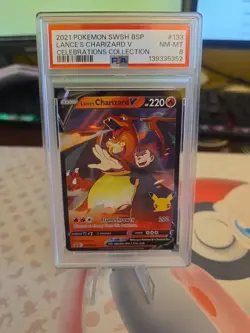 GRADED PSA 8 2021 Pokemon SWSH BSP Lance’s Charizard V Celebrations Coll #133 - Image 1