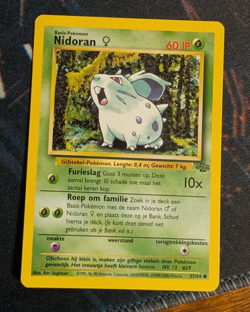 Pokemon TCG - Nidoran 57/64 - Jungle Unlimited - Dutch (a) - Image 1