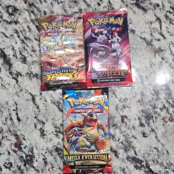 Pokemon TCG Booster Packs, Surging Sparks, Distorted Rivals, & Mega Evolution - Image 1