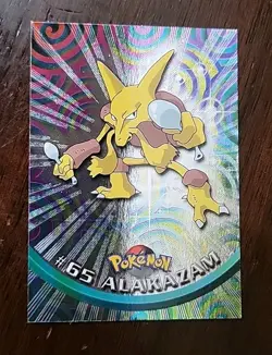 LP! RAYS HOLO Foil Alakazam #65 Topps Pokemon Series 1 BLACK label - Image 1