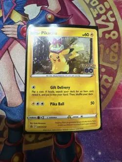 Pikachu SWSH234 LP 2022 Cosmos Holo Black Star Promo Pokemon GO Card - Image 1