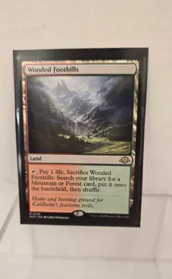 Magic the Gathering Modern Horizon 3 Wooded Foothills *Near Mint* - Image 1
