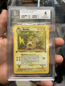 1999 POKEMON FOSSIL 1st Edition RAICHU (HOLO) #14/62 WOTC BGS 4 Vintage - Image 1