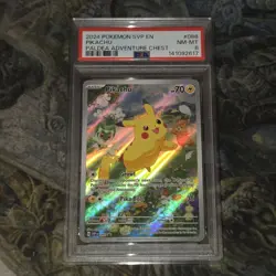2024 Pokemon SVP EN-SV BLACK STAR PROMO PALDEA ADVENTURE CHEST PIKACHU PSA 8 - Image 1