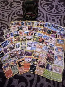 Huge Pokemon Card Lot, Plus Tin Container And Collectors Coin - Image 1