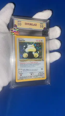 Snorlax 11/64 Graded 10 Mint PGC pokemon holo 1999 - Image 1