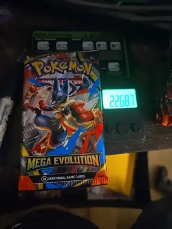 VERY HEAVY Pokemon TCG Mega Evolution Booster Pack In Hand MINT - Image 1