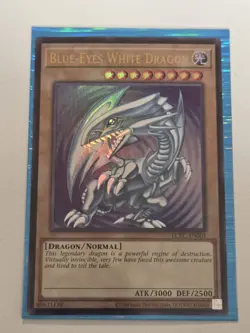 Blue-Eyes White Dragon LCKC-EN001 (Version 2) Ultra Rare Holo Foil Bleed SDK Art - Image 1