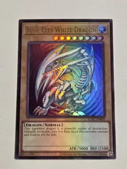 Blue-Eyes White Dragon LCKC-EN001 (Version 2) Ultra Rare Holo Foil Bleed SDK Art - Image 2