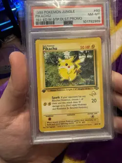 1999 POKEMON JUNGLE 1ST ED W STAMP DUELIST PROMO #60 PIKACHU PSA 8 - Image 1