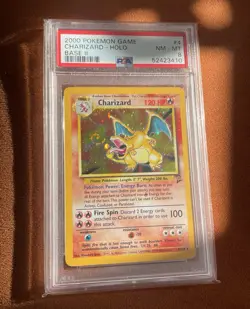 2000 Pokemon Base Set 2 Holo Charizard #4 PSA 8 Perfect Swirl - Image 1