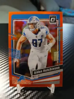 2023 Donruss Optic Football Aidan Hutchinson #58 Orange Prizm SP 143/249 - Image 1