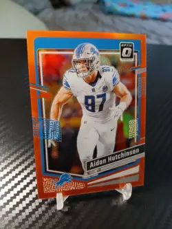 2023 Donruss Optic Football Aidan Hutchinson #58 Orange Prizm SP 143/249 - Image 2