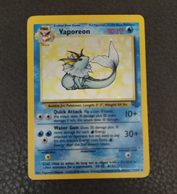 Pokemon Vaporeon 12/64 Jungle Holo Rare Card 1999 Stage 1 Unlimited Damaged - Image 1