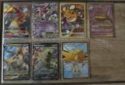 Pokemon Card Lot Charizard GX Dragonite V Tyranitar V Zapdos ex Hoopa - Image 1