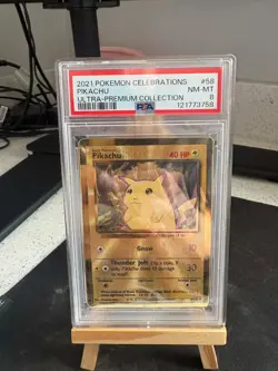 2021 Pokemon Gold TCG Celebrations Pikachu UPC Promo Gold Metal PSA 8 - Image 1