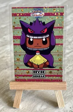 Eevee Gengar Poncho - Pokemon Lets Go Eevee Card Database (Gold Holo Stars) - Image 1