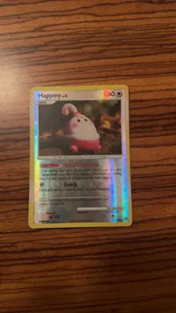 Happiny 52/123 Diamond & Pearl Reverse Holo - Image 1