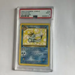 1999 POKEMON JUNGLE 1ST ED #28 VAPOREON PSA 9 - Image 1